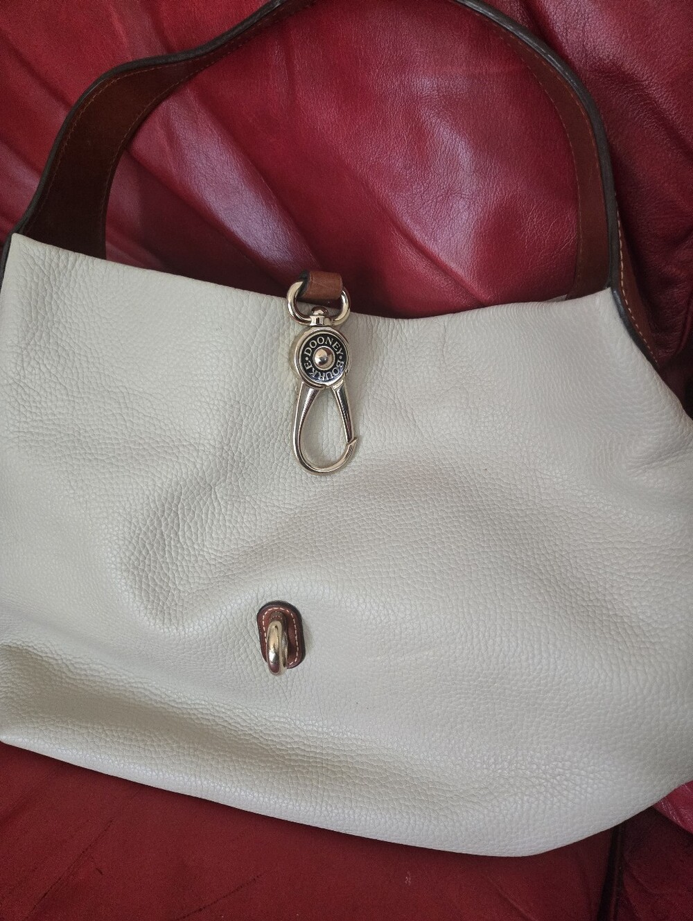Dooney & Bourke Cream Leather Shoulder Bag with Brown Trim